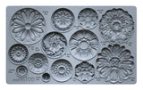 A close-up of the Rosettes 6 x 10 IOD Décor Mould showing intricate floral and medallion designs, ideal for crafting and DIY projects.
